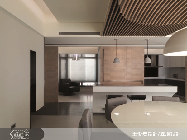 以一張圓桌為起點的設計。為滿足屋主過年時邀請客人來